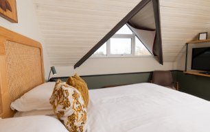 Snug guestroom rabbit hotel The Rabbit Hotel